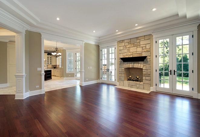 professional installation of hardwood flooring in progress